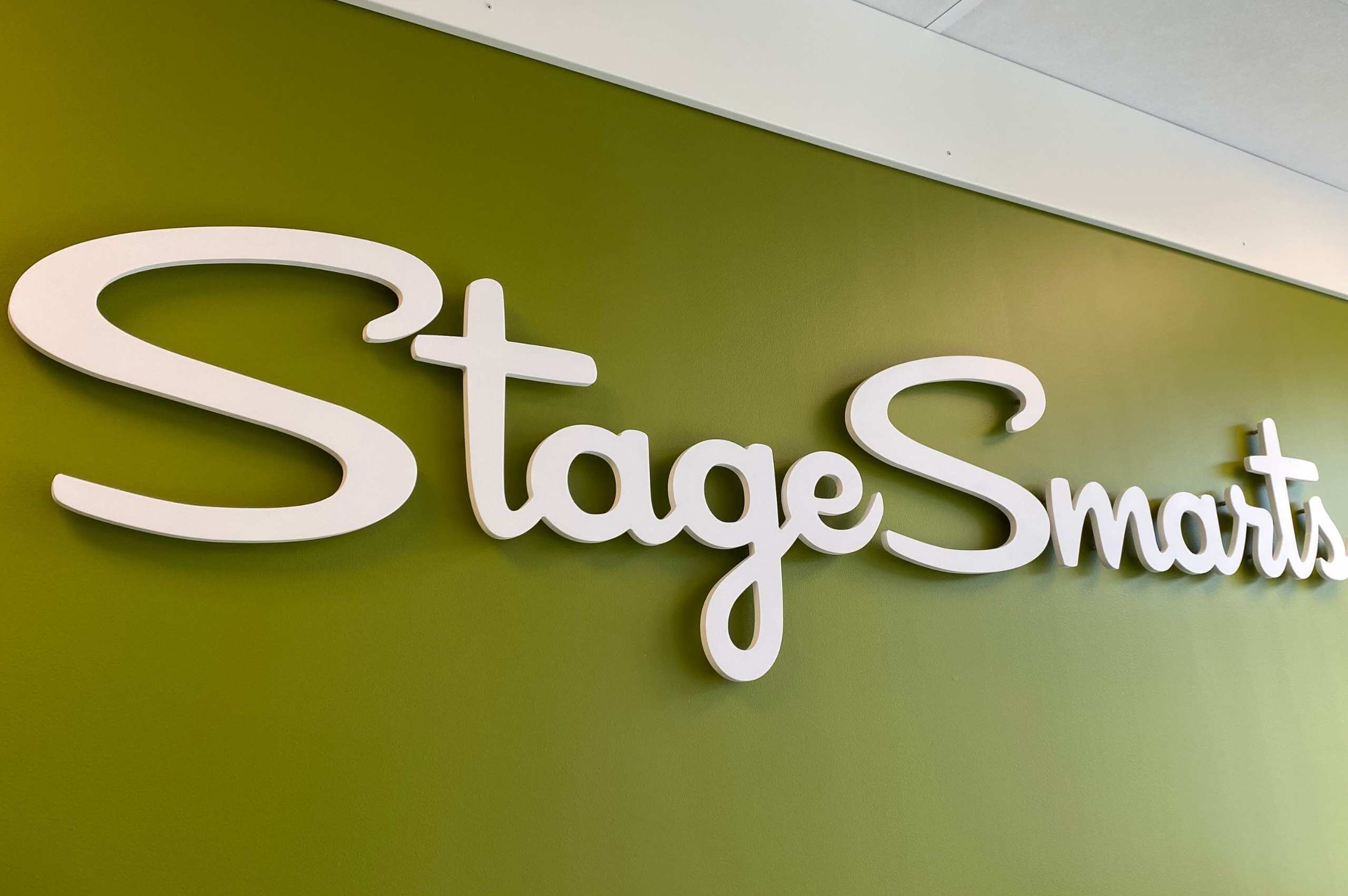 Stage smarts logo on wall
